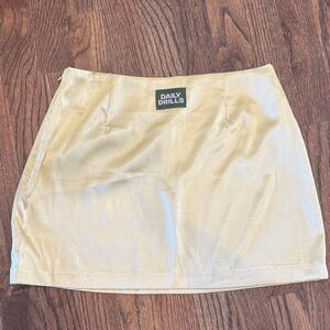 Daily Drills Women's light yellow skirt.  Small